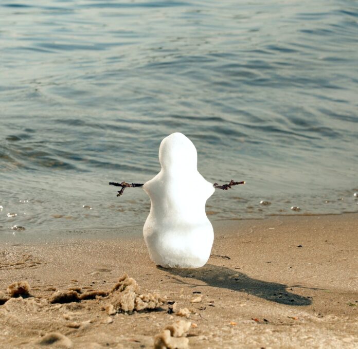 Snowman on beach
