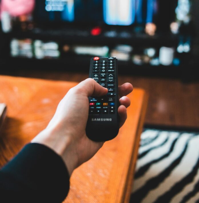 Remote pointed at a television